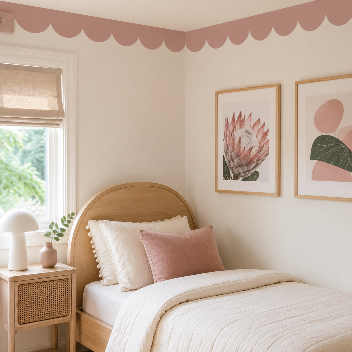 Dusty rose peel-and-stick scallop wallpaper border applied along the ceiling in a cozy girls’ bedroom with an arched wooden bed.