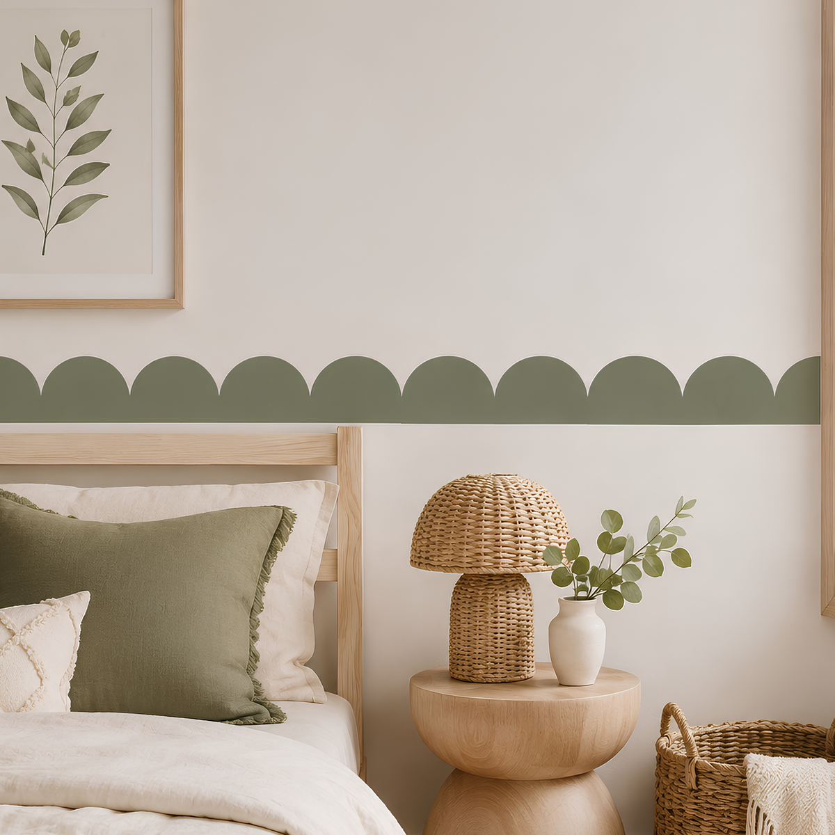Peel-and-stick scallop wallpaper border in olive green, styled above a wooden bed in a modern kids’ bedroom.