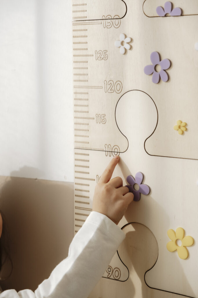 personalized-wooden-growth-chart-in-neutral-nursery