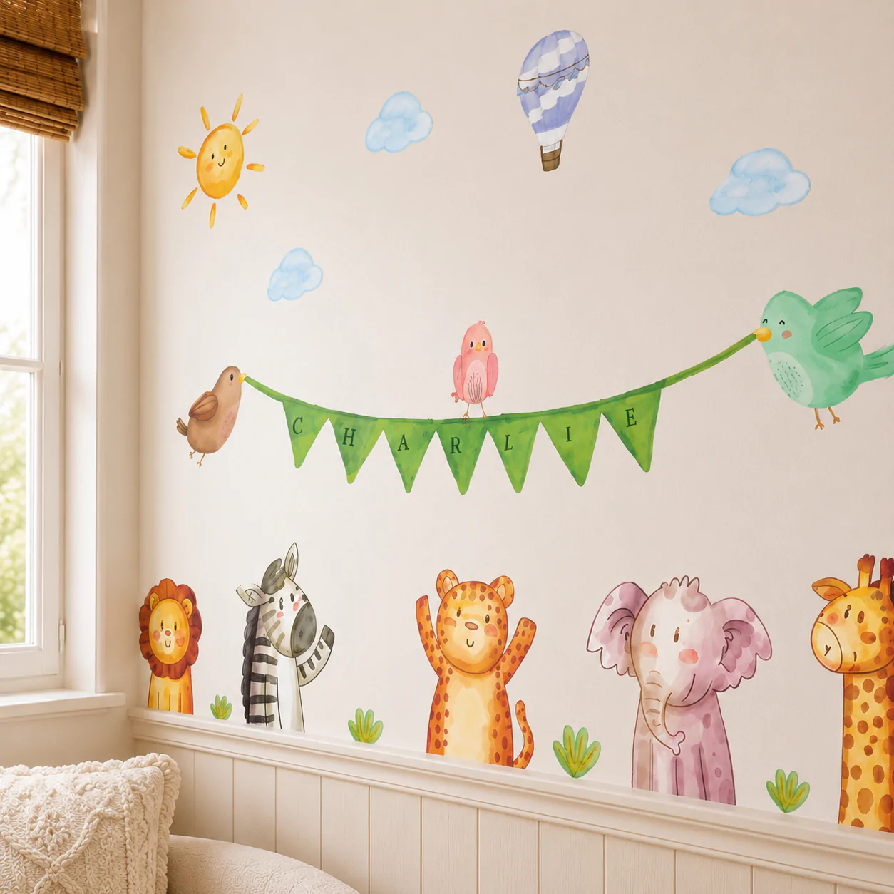 Custom Baby Safari Animals Textile Decal Colorful Custom Baby Safari Animals Textile Decal featuring a line of cute jungle animals with a custom banner, applied above a crib.