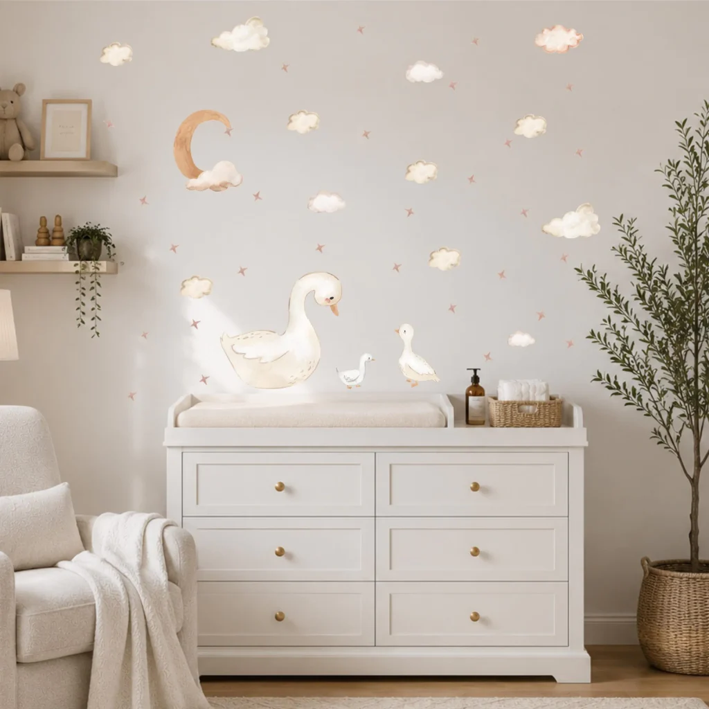 Baby and mom duck wall decals in a soft blue nursery